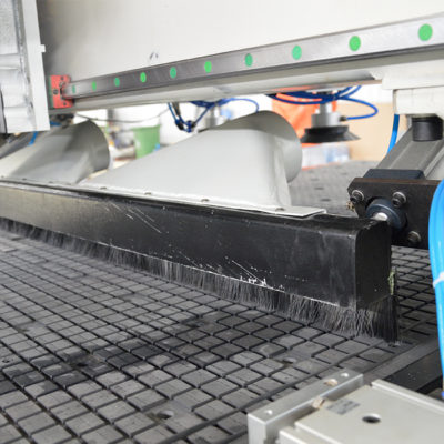 sweeper arm for nesting router