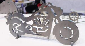 Advantages of Fiber Plate and Tube Cutting Machines? Fiber-laser-cutting-metal-4-300×225
