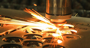 How Fiber Laser Cutting Machines Support Small Business Growth? laser-cut-metal-4373878_1280